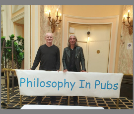 "National Philosophy Festival in Liverpool", England, June 2019. About "Morality", "Nationhood", "Identity" and "How to Defend yourself from crooked Thinking!" (Über Moral, Nationalität, Identität und Wie verteidigt man sich gegen falsches Denken). Mit David Spencer, Schriftsteller und baKum Mitarbeiter.
